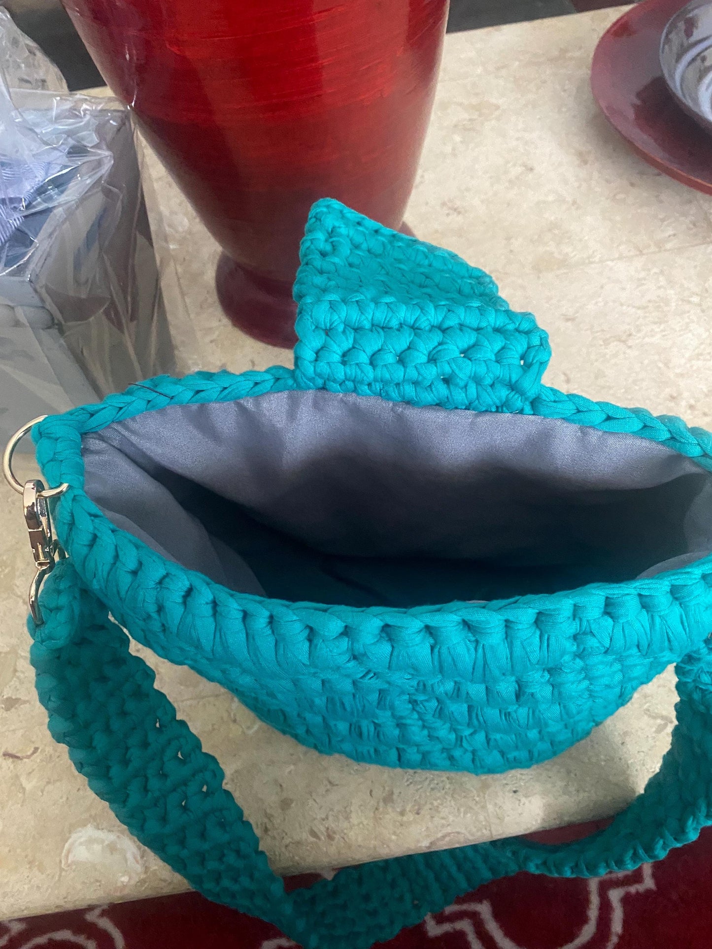 Handmade crocheted shoulder bag with leather bottom