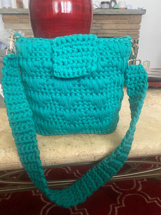 Handmade crocheted shoulder bag with leather bottom